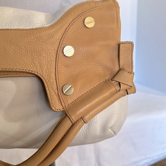 Foley & Corrina cross body clutch bag cream and pumpkin colored pebble leather. - Picture 5 of 8